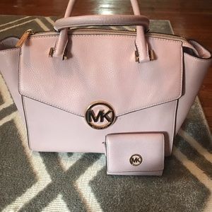 Pink Michael Kors handbag with matching wallet